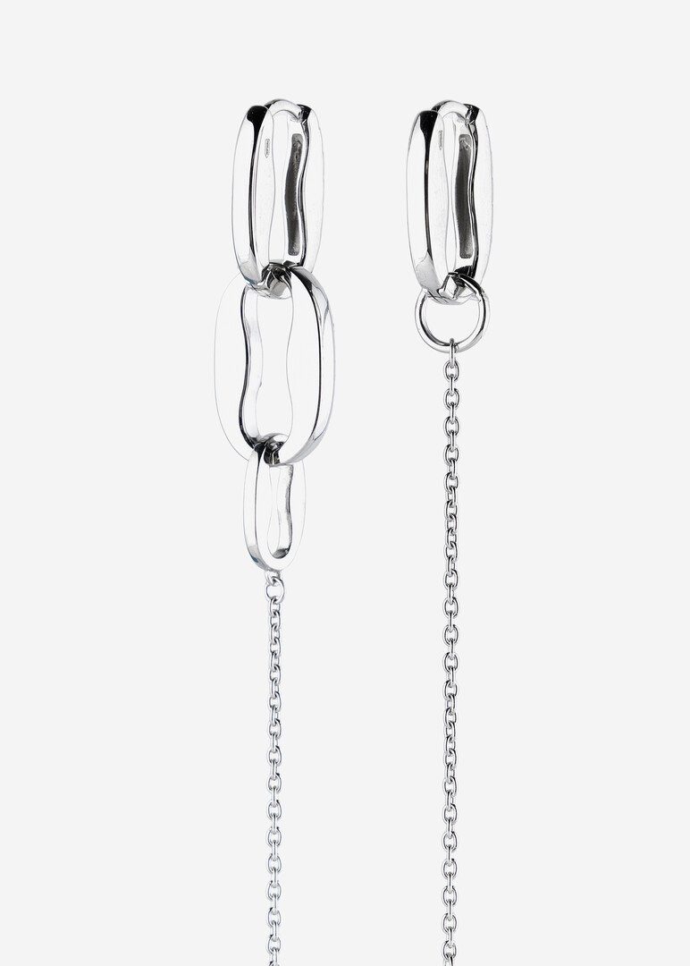 silver earrings with blue cubic zirconia and a removable chain