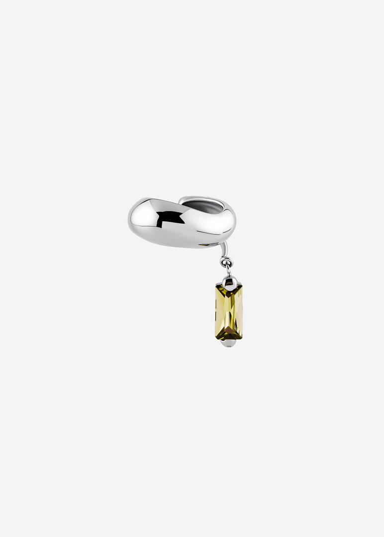 silver cuff with green cubic zirconia for the left ear