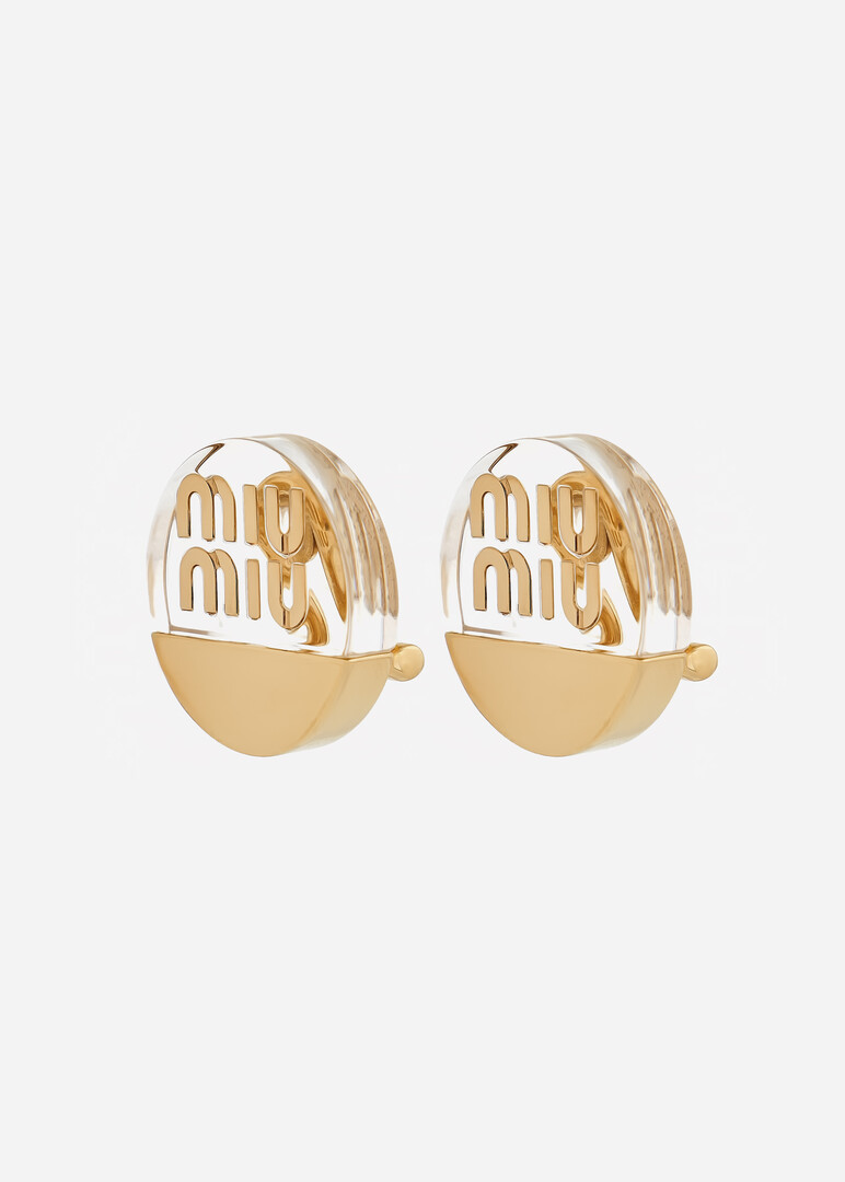 Golden clip on  Miu Miu