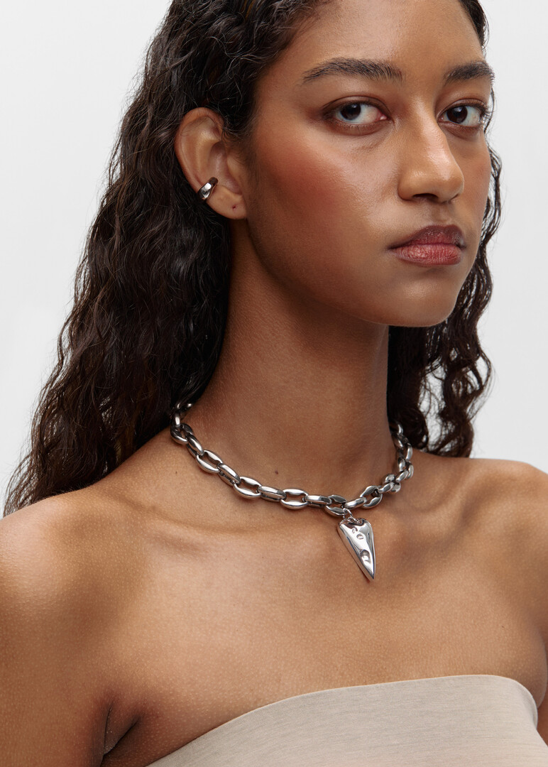 Choker with a massive LUCKY HEART PLAY made of steel and bronze with rhodium coating