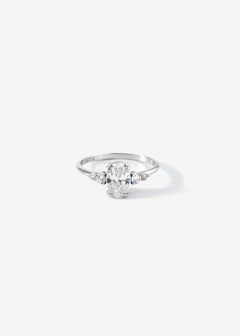 A ring made of gold with a grown diamond cut oval "Your charm"