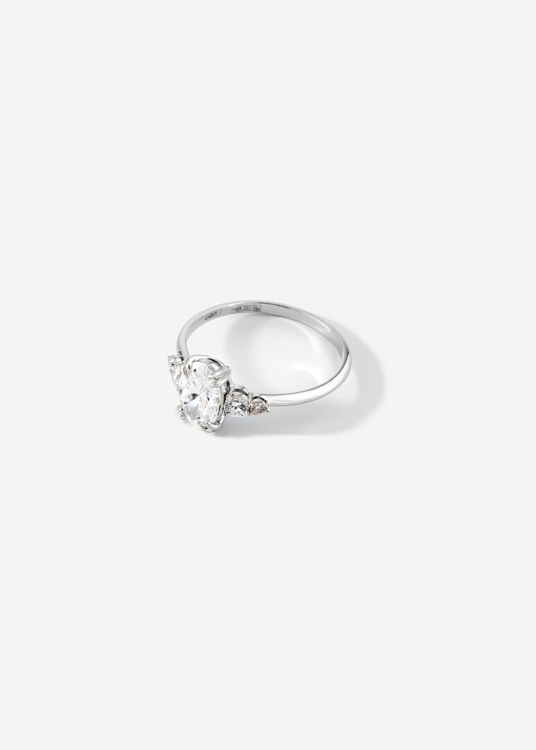 A ring made of gold with a grown diamond cut oval "Your charm"