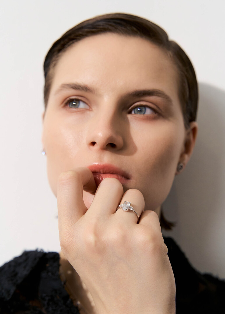 A ring made of gold with a grown diamond cut oval "Your charm"