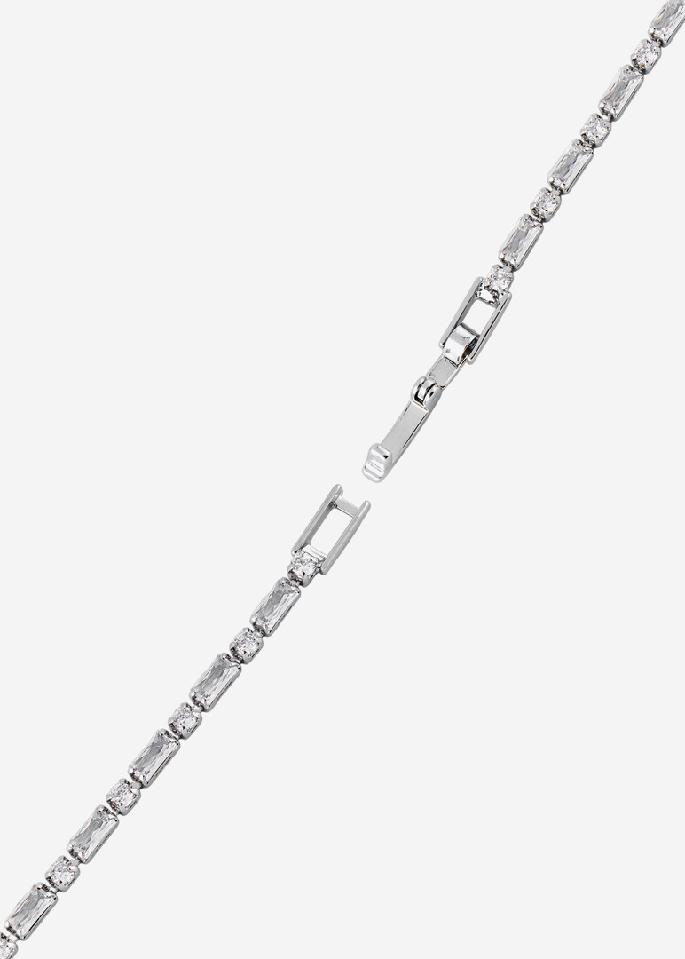 silver-tone bracelet with a rainbow heart