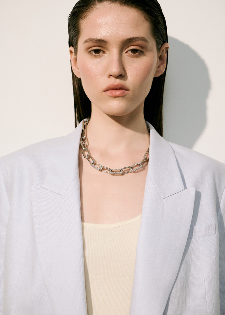 silver-tone chain with crystal