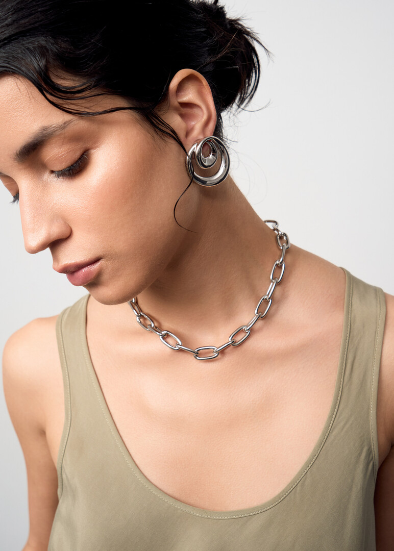 silver-tone chain with an oval link