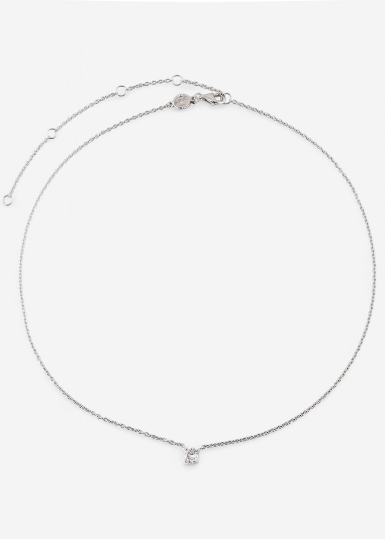 silver tiara with cubic zirconia