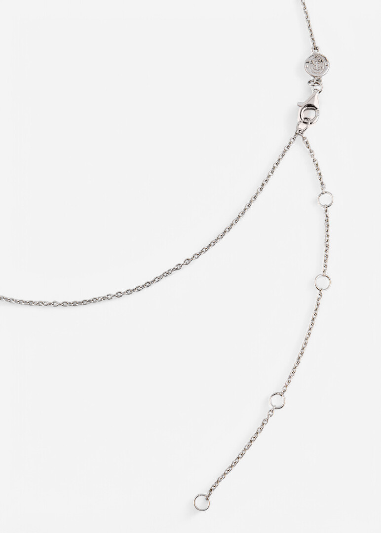 silver tiara with cubic zirconia
