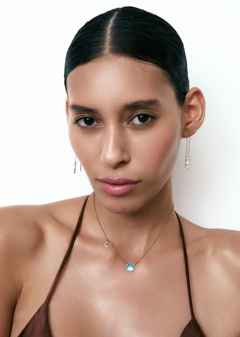 Gold necklace with enamel and diamond pendant