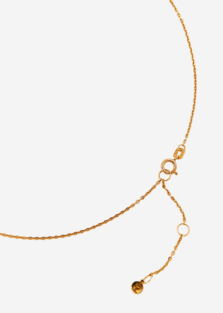 gold necklace with diamond sun pendant
