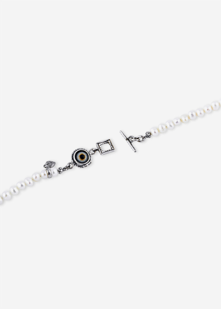 silver pearl and blue eye bracelet