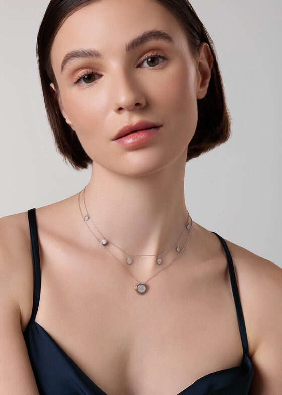 white gold necklace with diamond small sun pendant