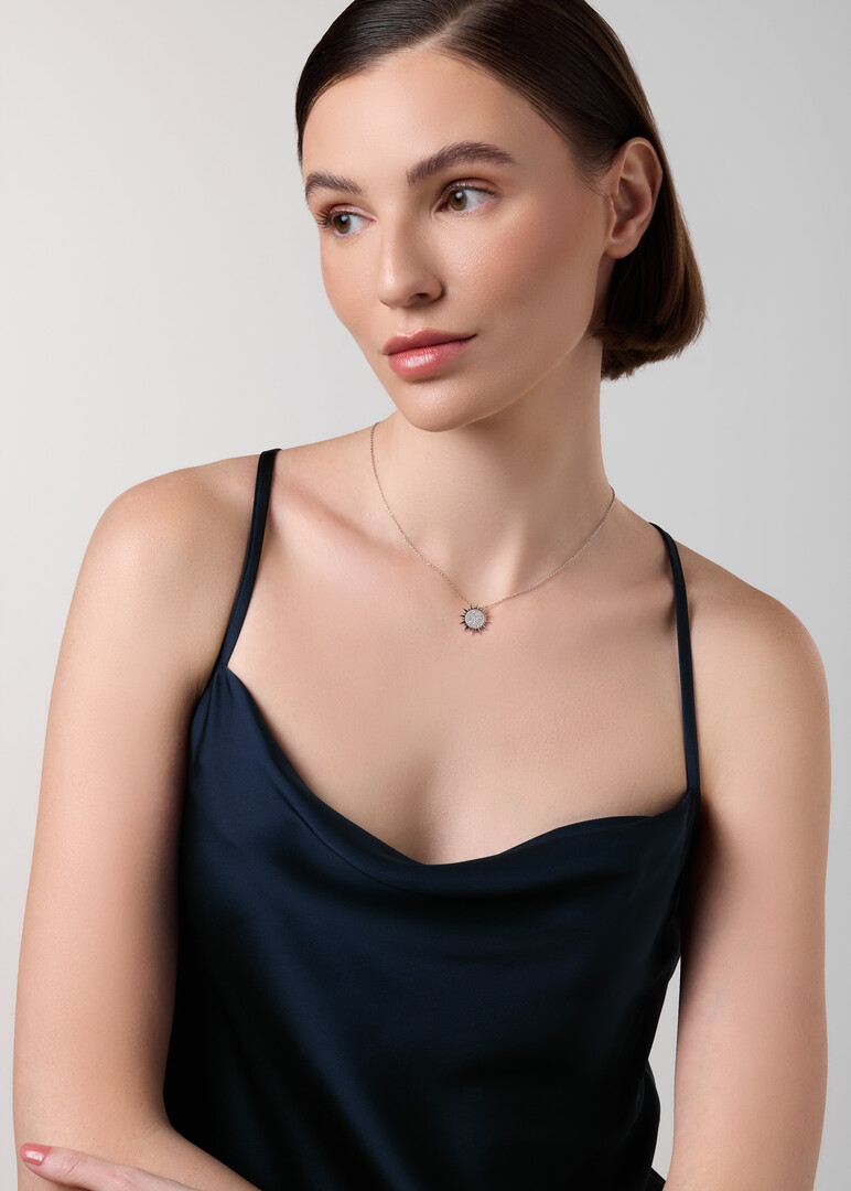 White Gold necklace with diamond sun pendant