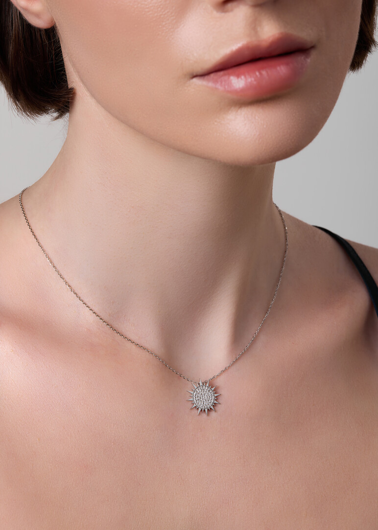 White Gold necklace with diamond sun pendant