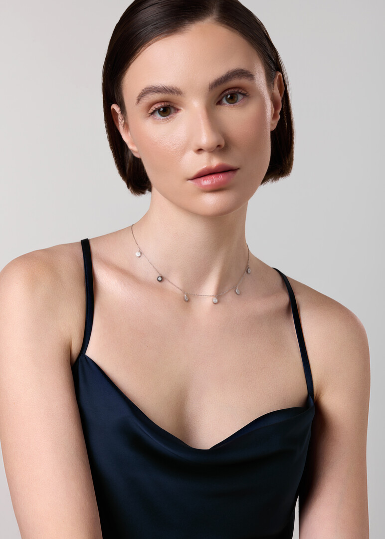 White Gold chain with multiple sun pendants