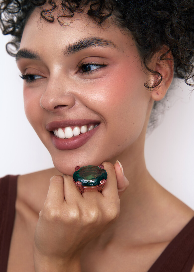 Ring with a Green Crystal