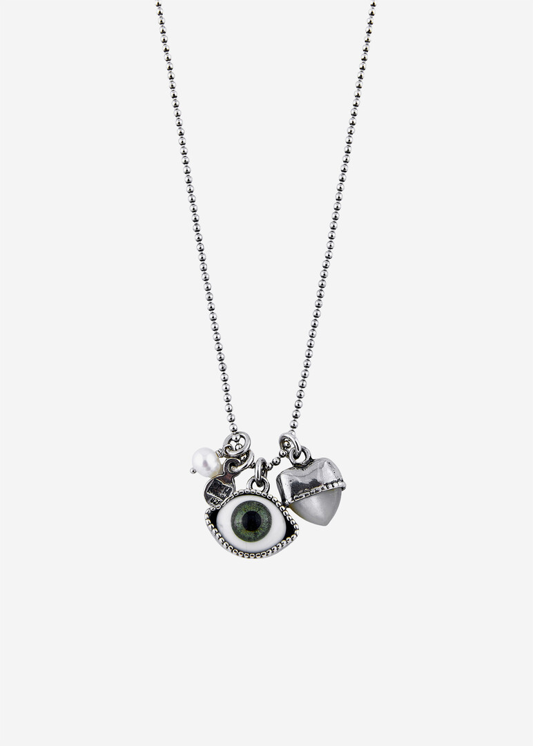 silver chain necklace with a green eye pendant