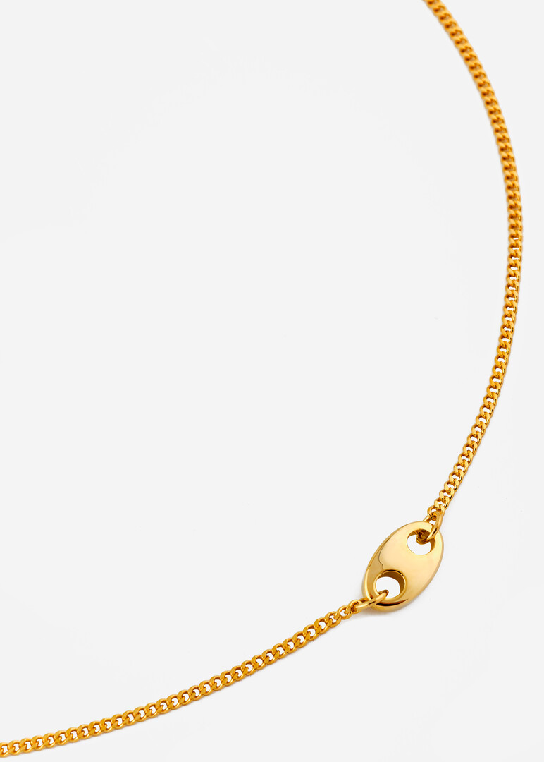long gold-tone chain with a pendant-drop