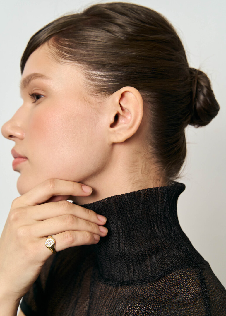 Gold ring with diamonds.