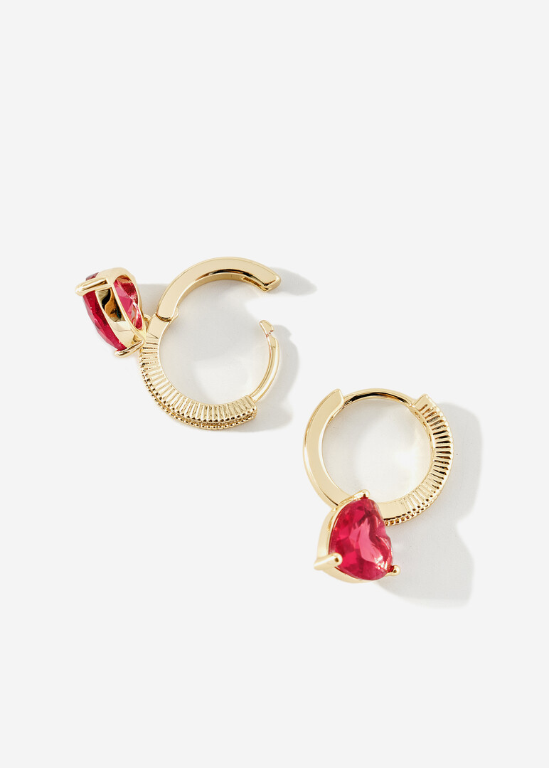 Small gold hoop earrings with red hearts