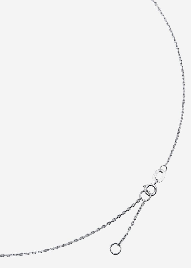 gold necklace with bird pendant and diamonds