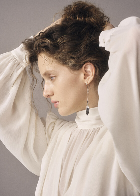 Асимметричные серьги Isabel Marant Асимметричные серебристые серьги с рогом буйлова Cala