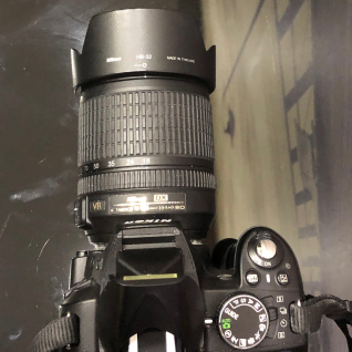 Фотоаппарат Nikon D3100 с объективом