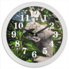 Заказать часы для офиса в Москве. Часы круглые из пластика Каменная девушка от Дана Столыпина - готовые дизайны и нанесение принтов.