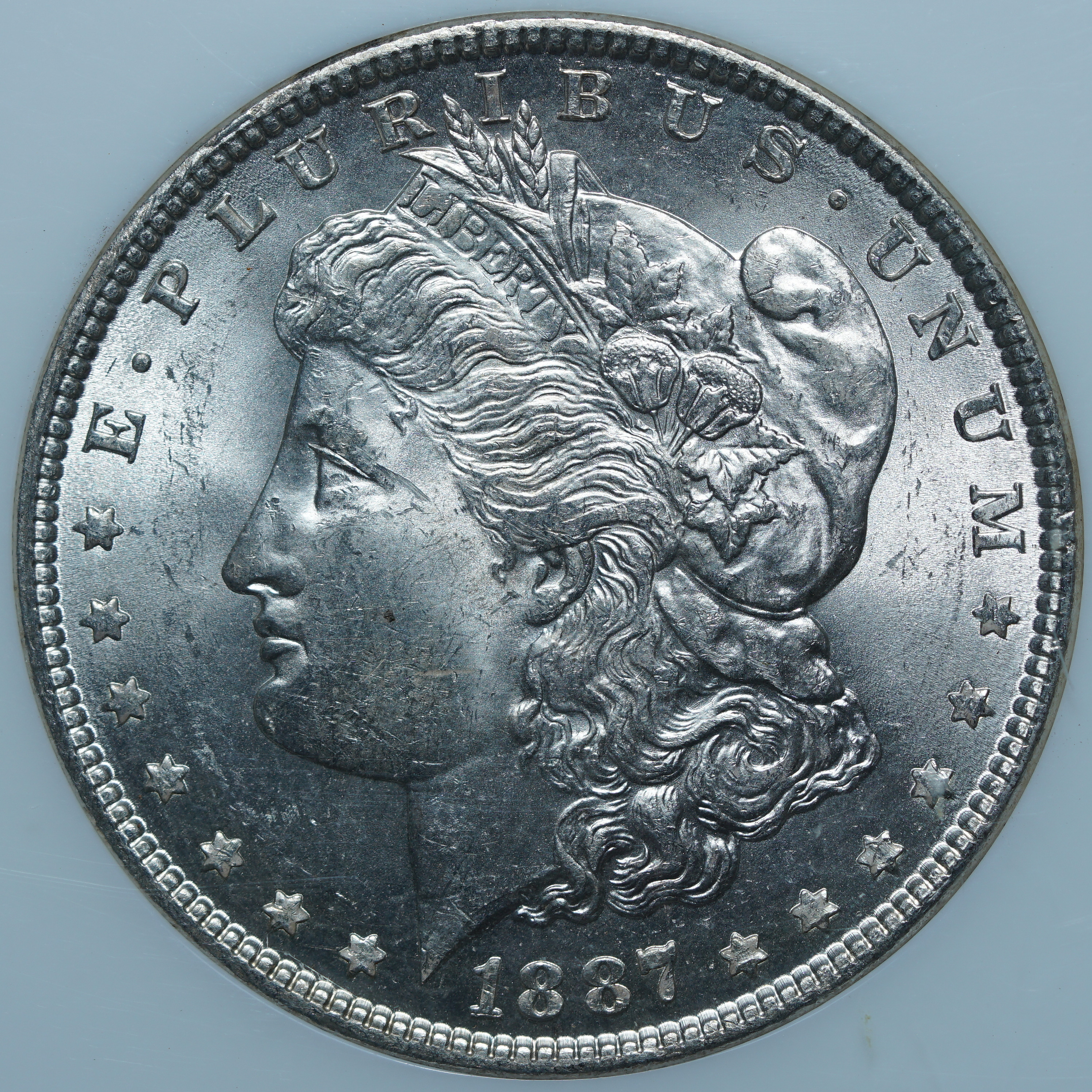 1 доллар 1887 MS64 NGC