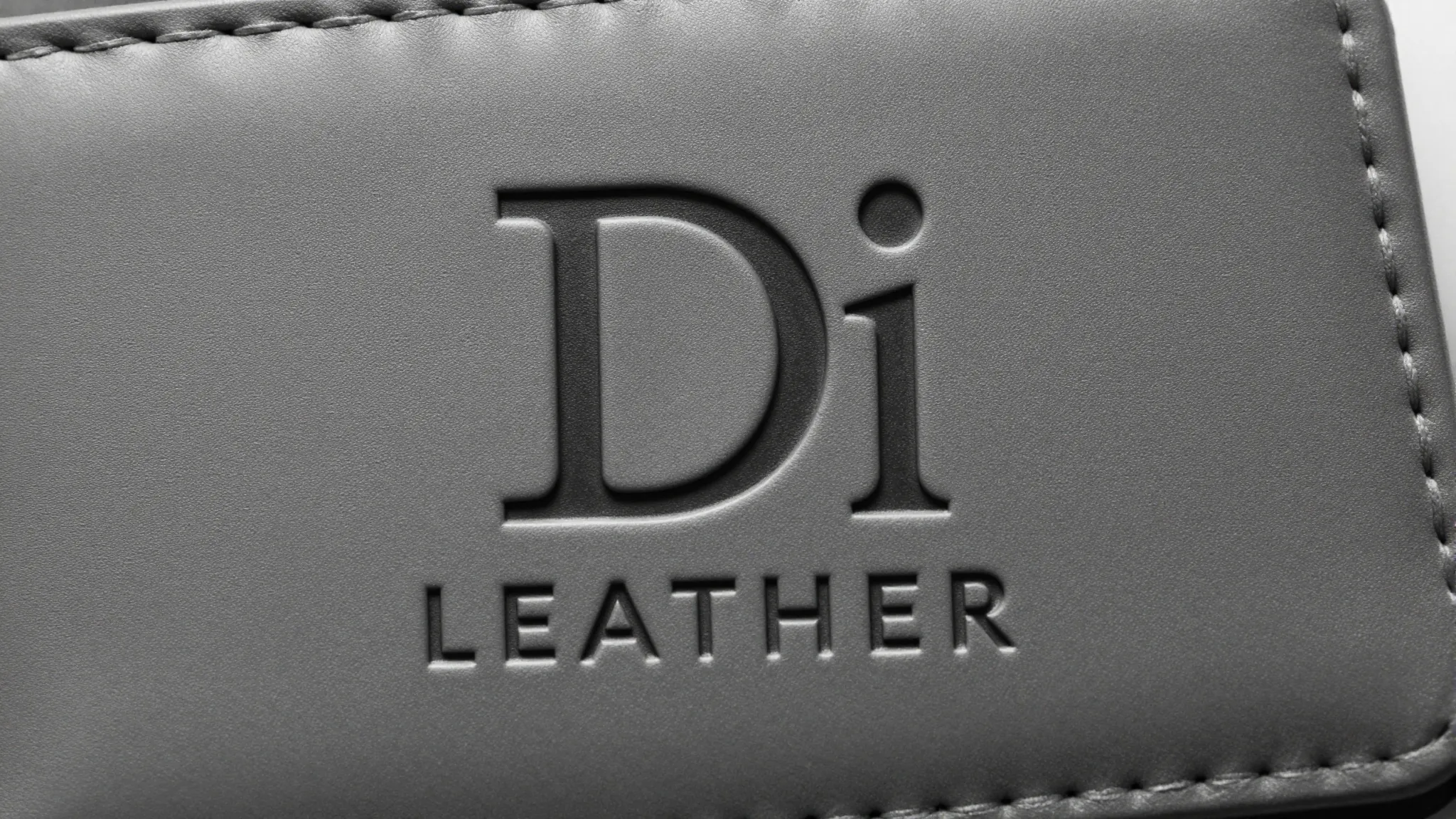 Modern minimalist logo. A stylized 'Di' written in a thick, ...