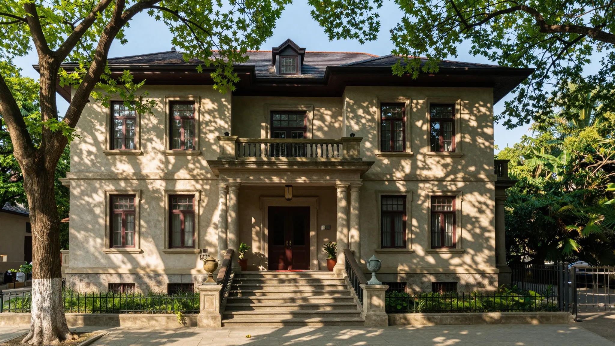 An aesthetic view of a 4-story old house with a grand stone ...