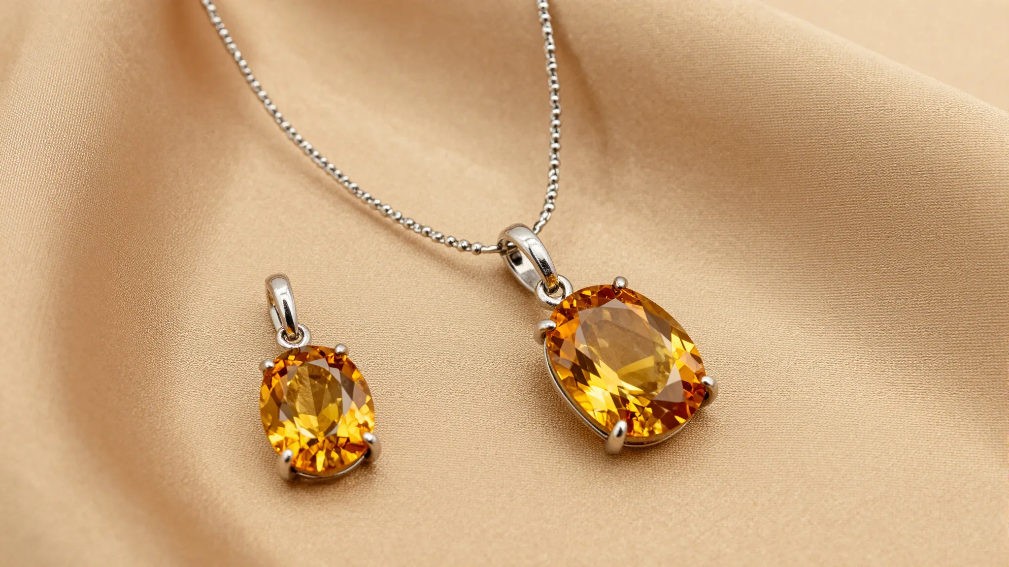 A beautiful citrine gemstone jewelry set on a silk backgroun...