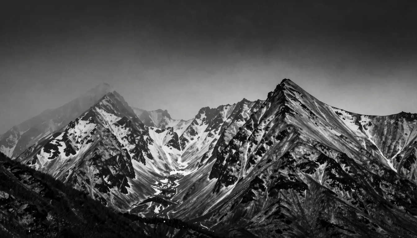 Grim and frostbitten mountain landscape, black and white pho...