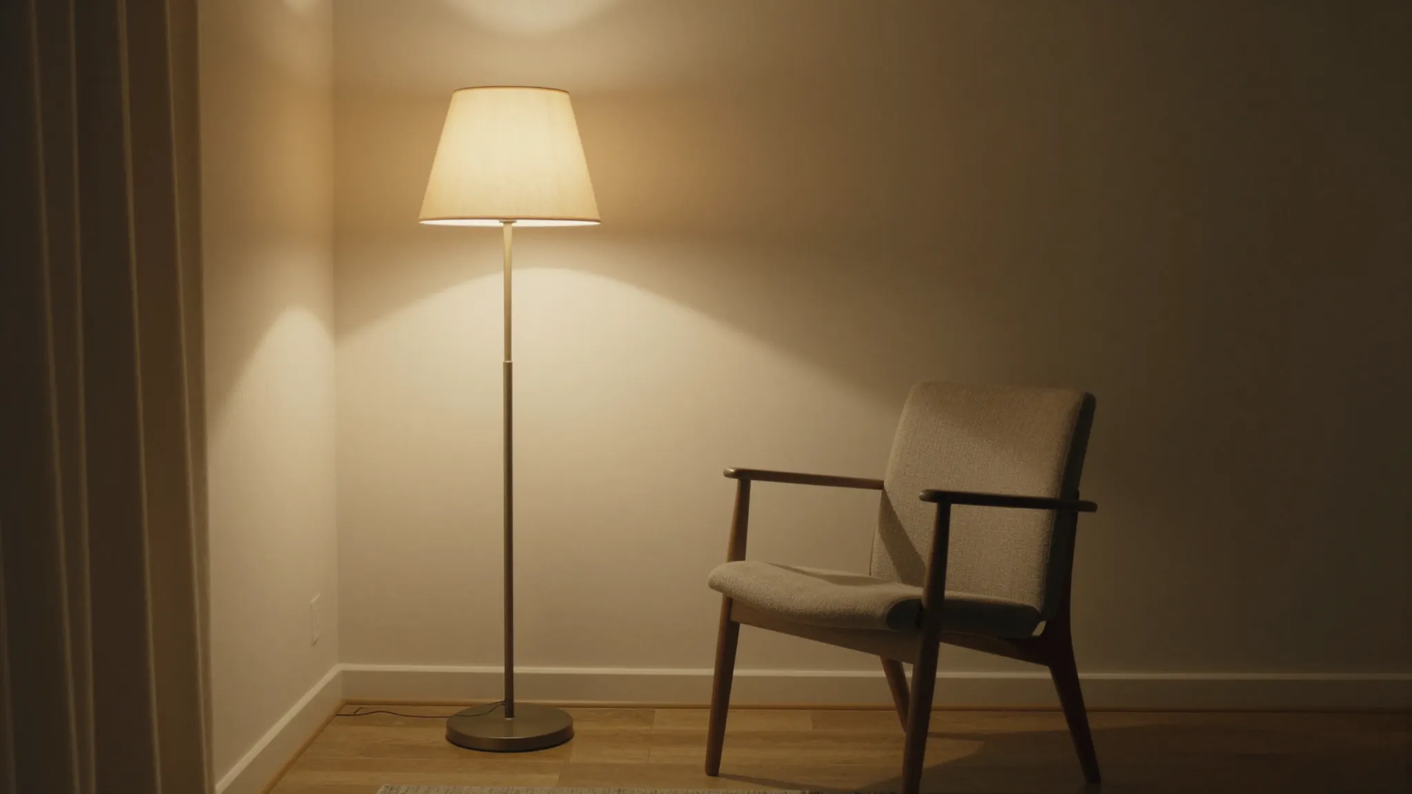 Cinematic wide shot of a cozy room with a single lamp, empty...