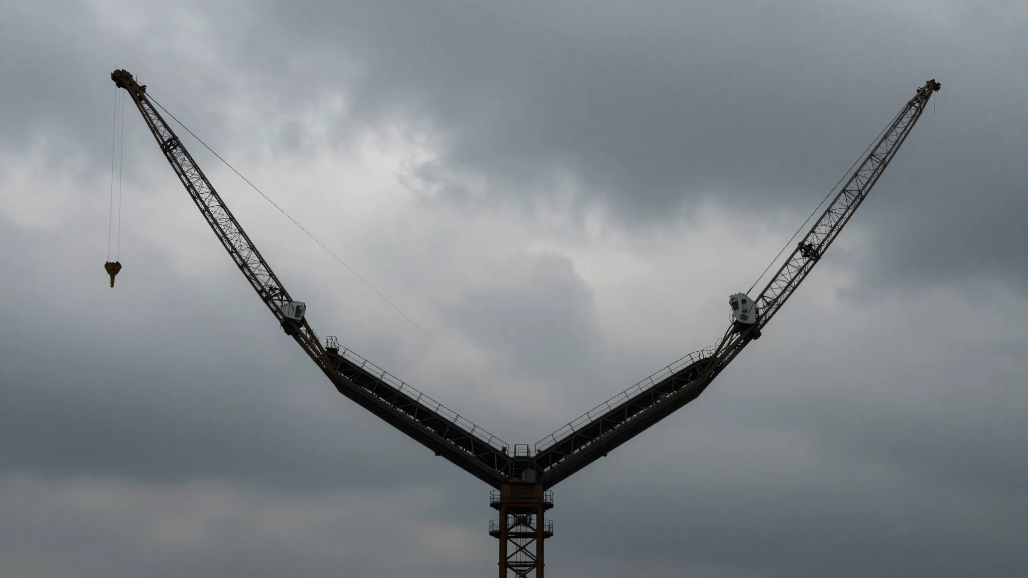 A large, perfectly symmetrical V-shaped wedge of cranes soar...