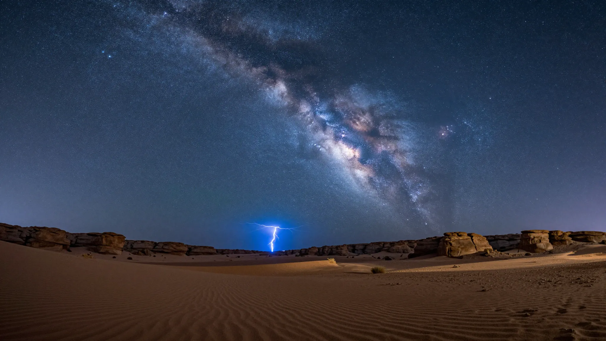 Night in the desert, vast starry sky with the Milky Way, glo...