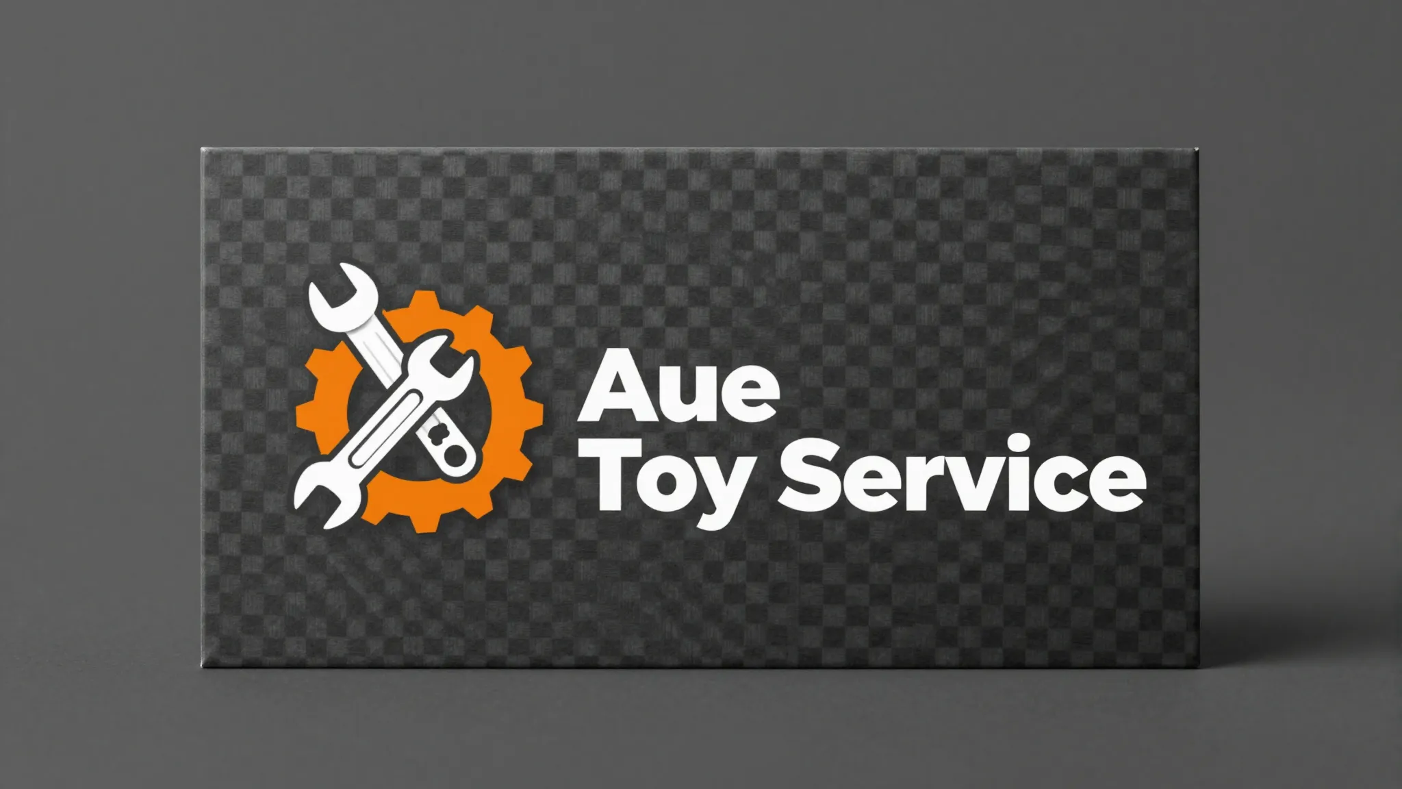 Front of a business card for 'Aue Toy Service', a profession...