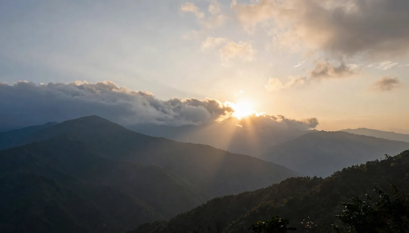 A serene mountain landscape at dawn with soft golden sunligh...
