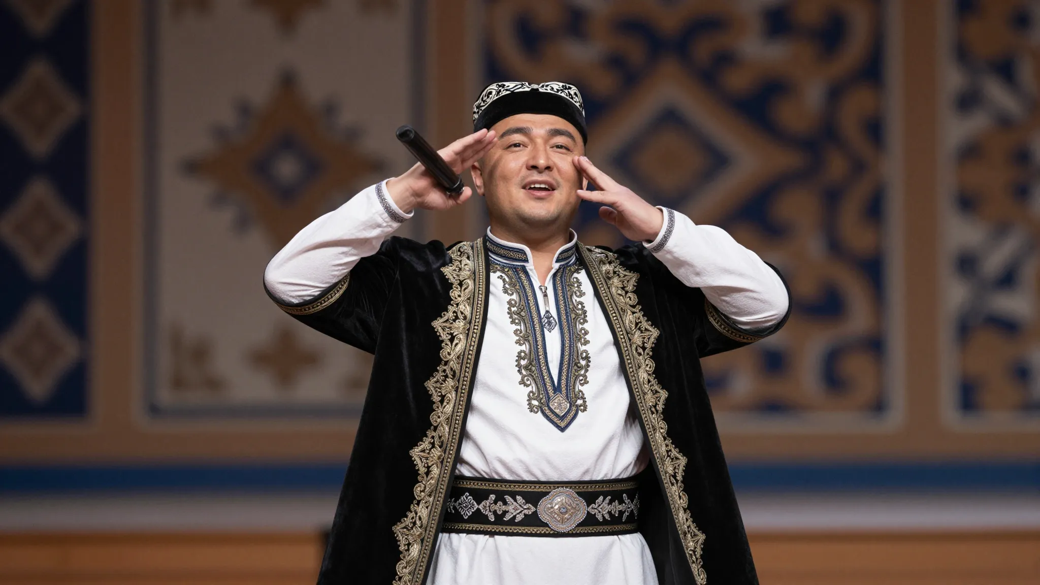 A charismatic man named Altynbek in a modern Kyrgyz outfit, ...