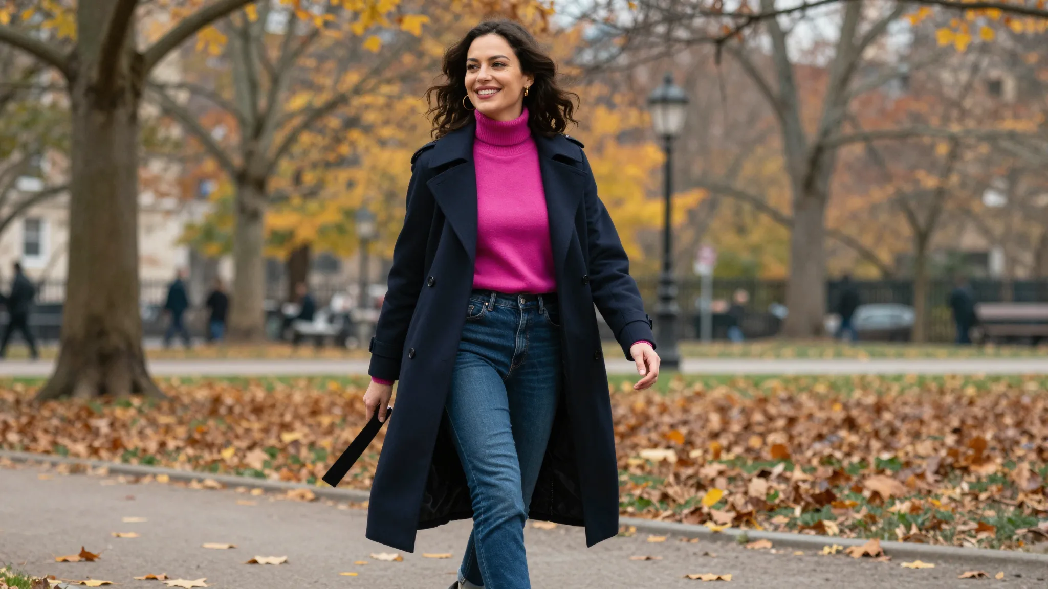 A stylish and happy woman walking in a beautiful city park, ...