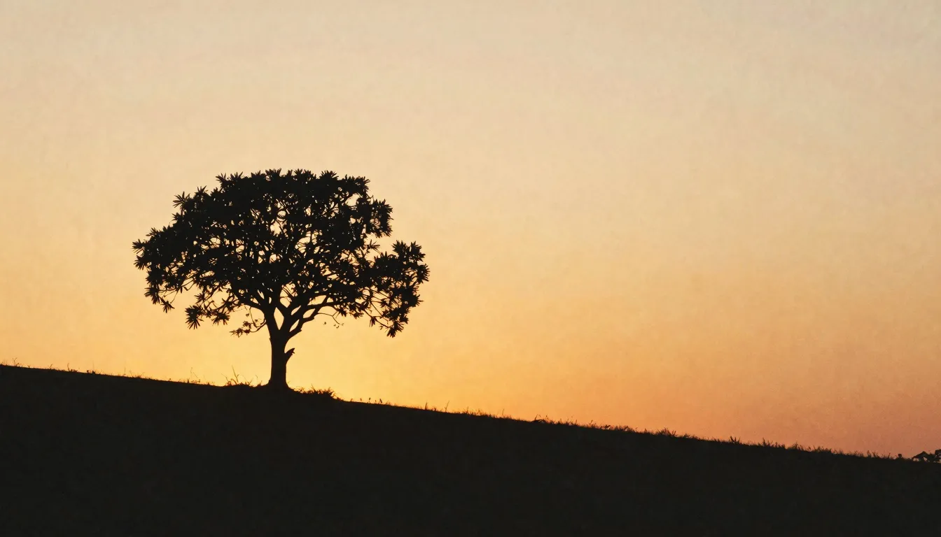 Watercolor style. Silhouette of a lone tree on a hill during...