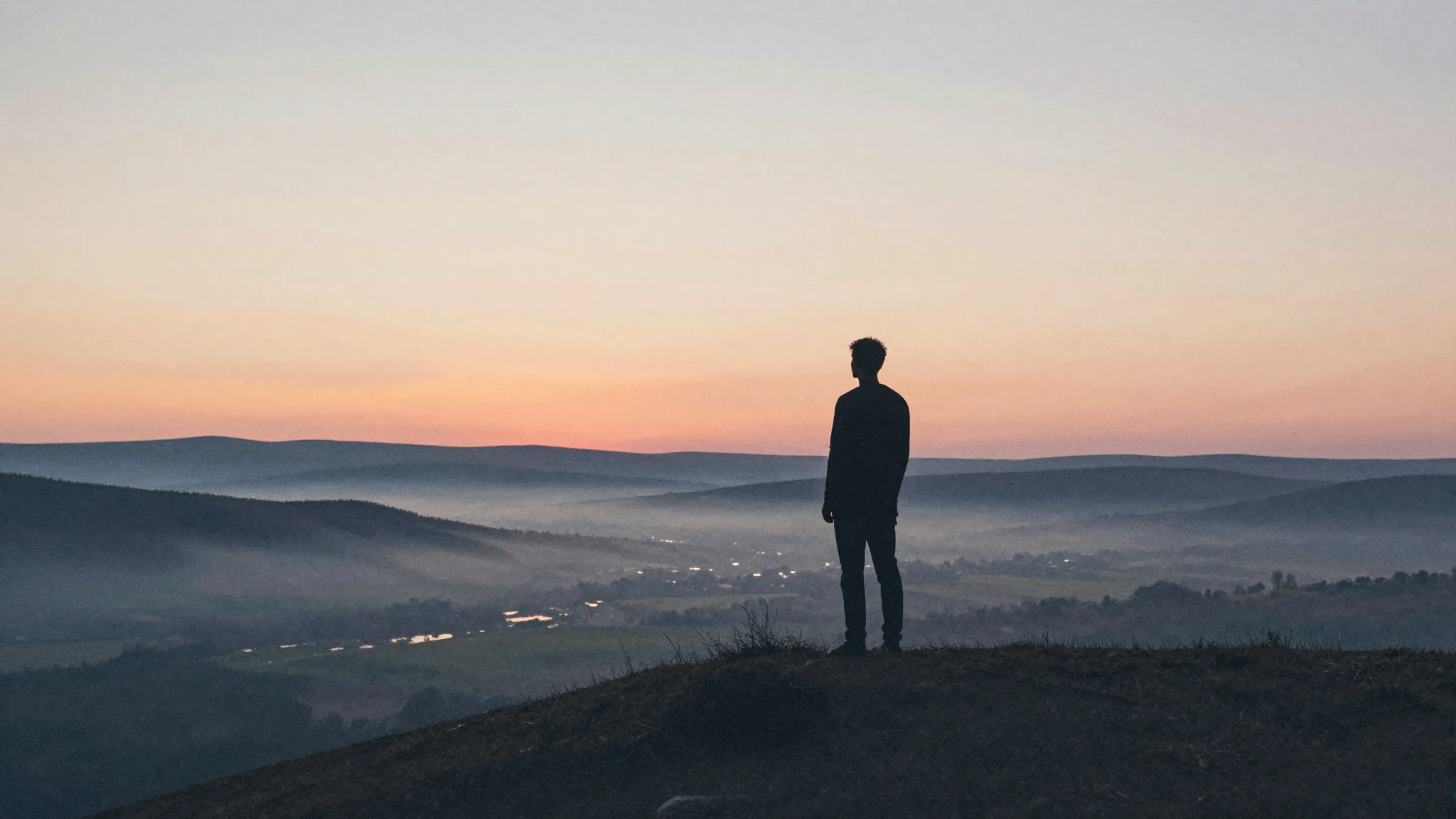 Watercolor style. A lonely silhouette stands on a hill at su...