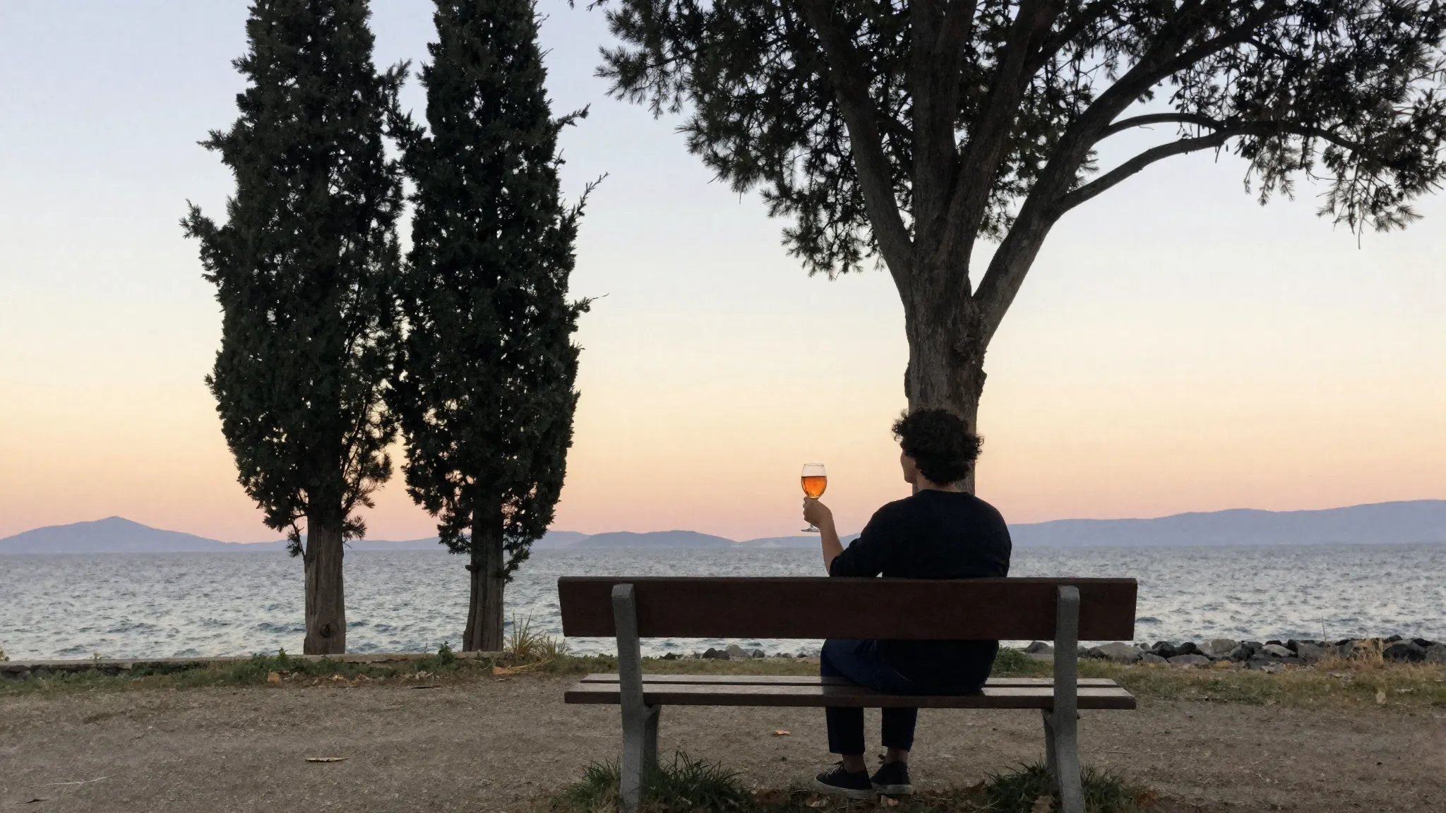 Watercolor style. A silhouette of a person sitting on a wood...