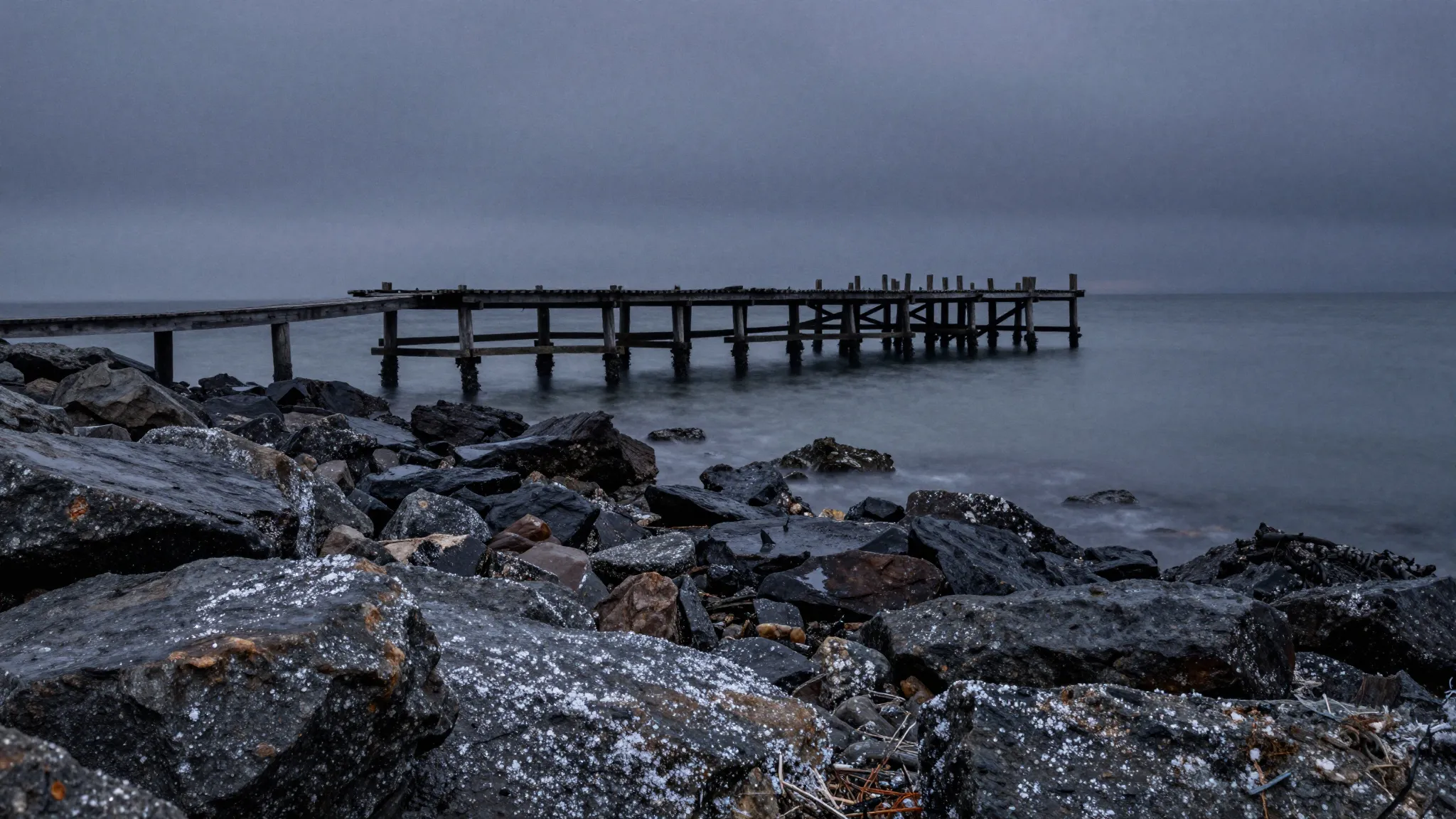 Watercolor style. A desolate rocky coastline at dusk, a deca...