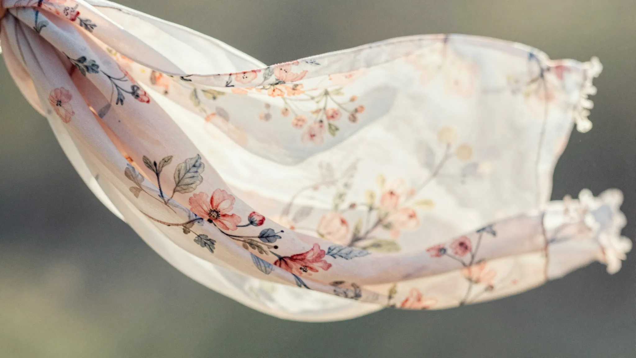 Watercolor style. Close-up of a beautiful flowing scarf with...