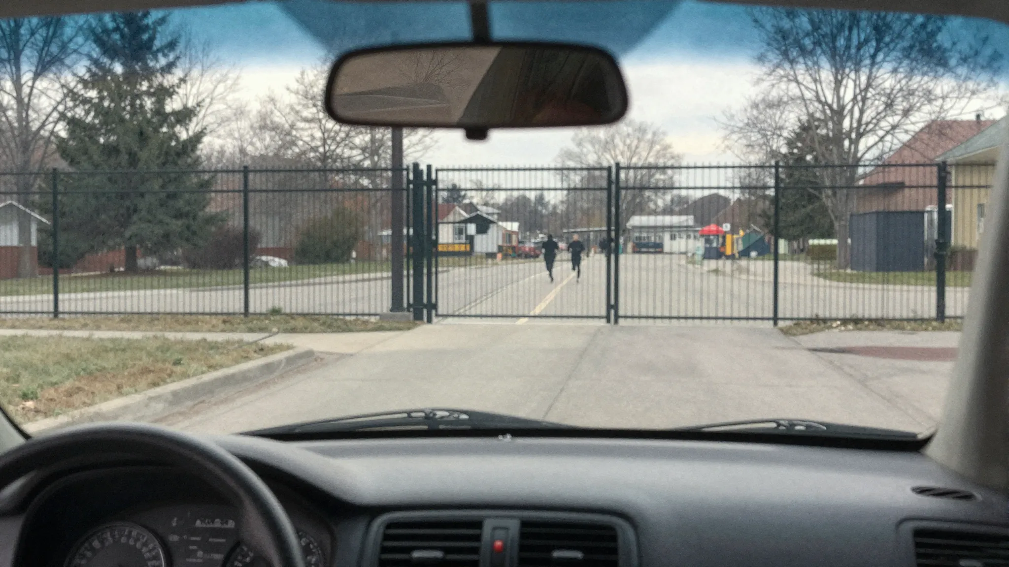 Watercolor style. View from inside a car looking through the...