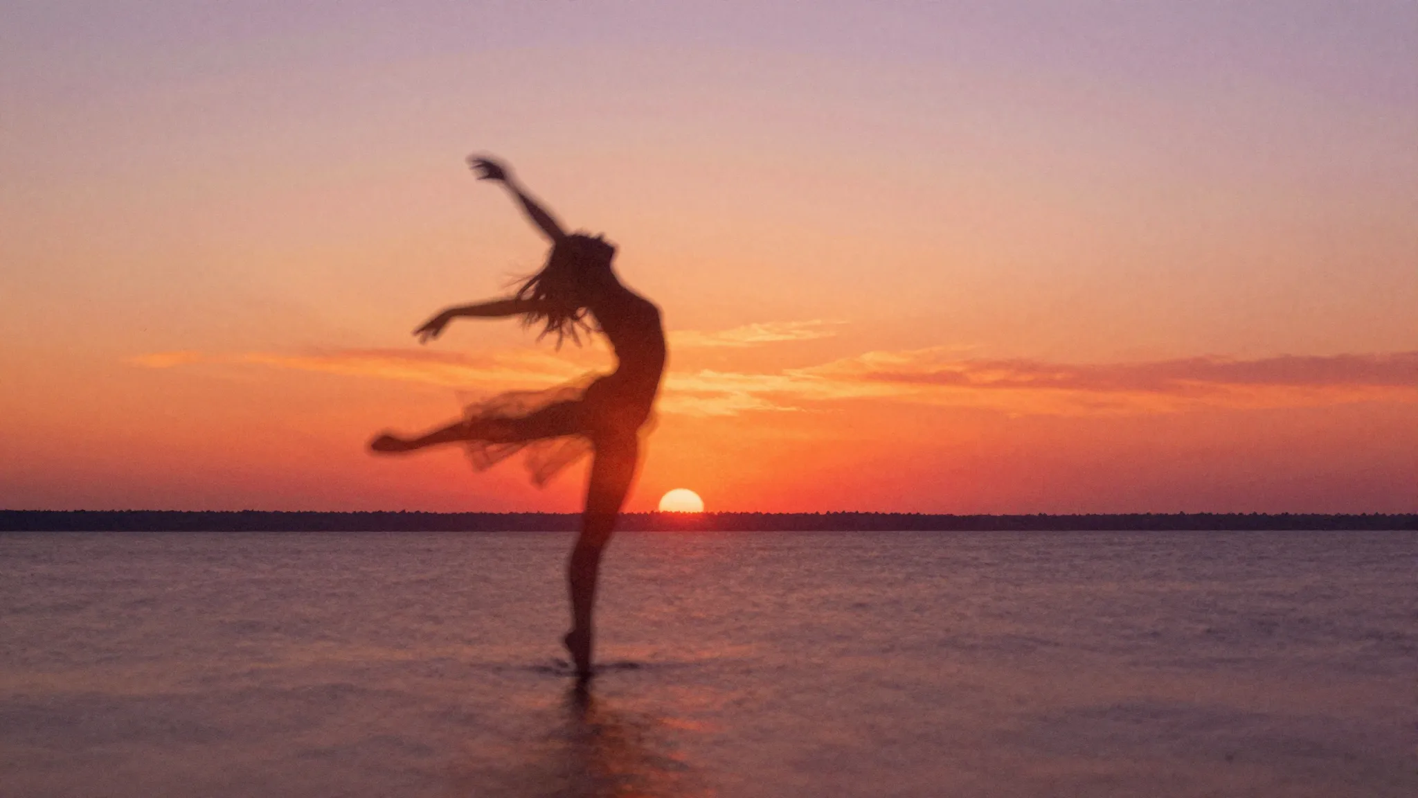 Watercolor style. A silhouette of a lone dancer against a vi...