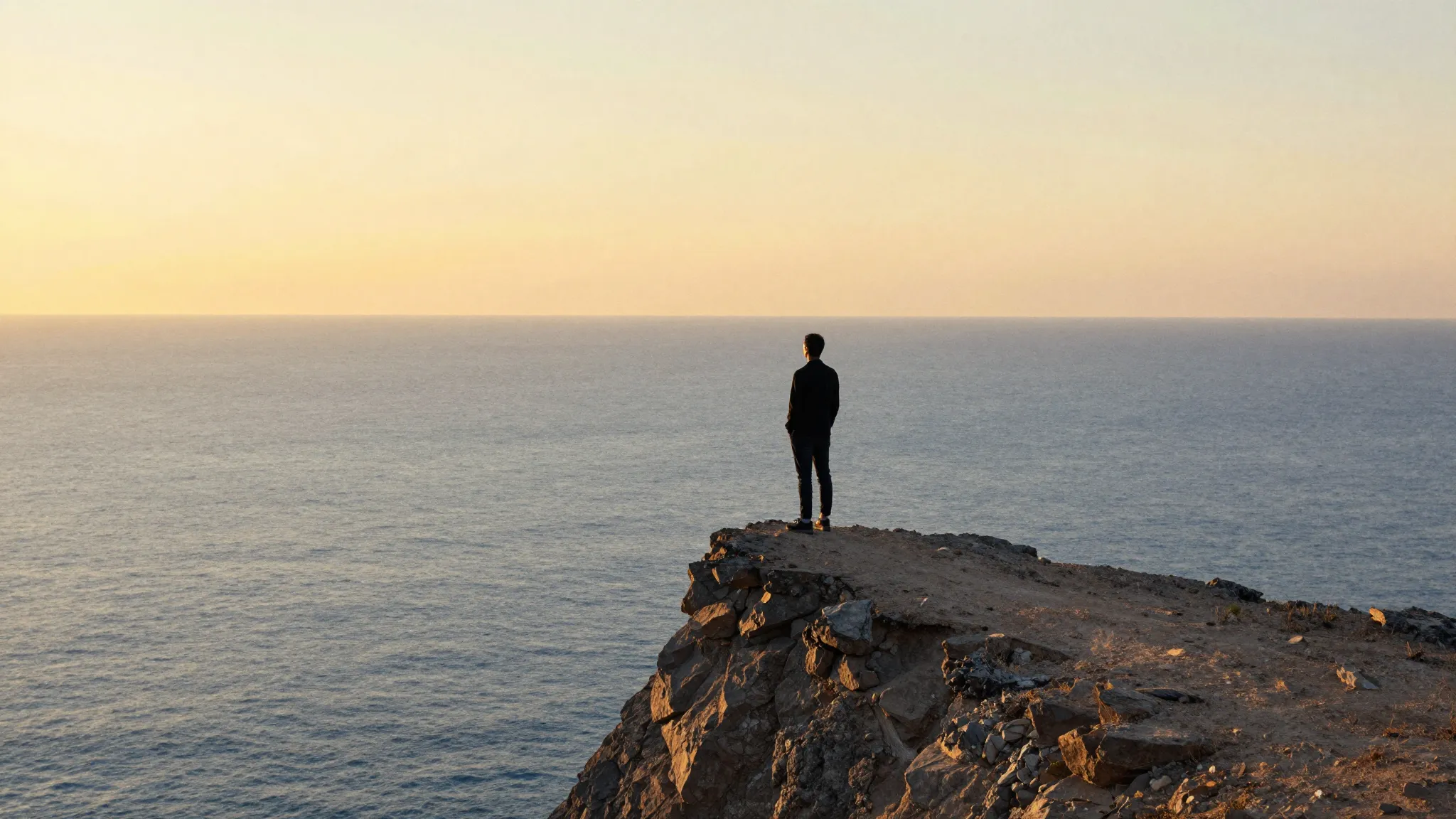 Watercolor style. A silhouette of a person standing on a hig...