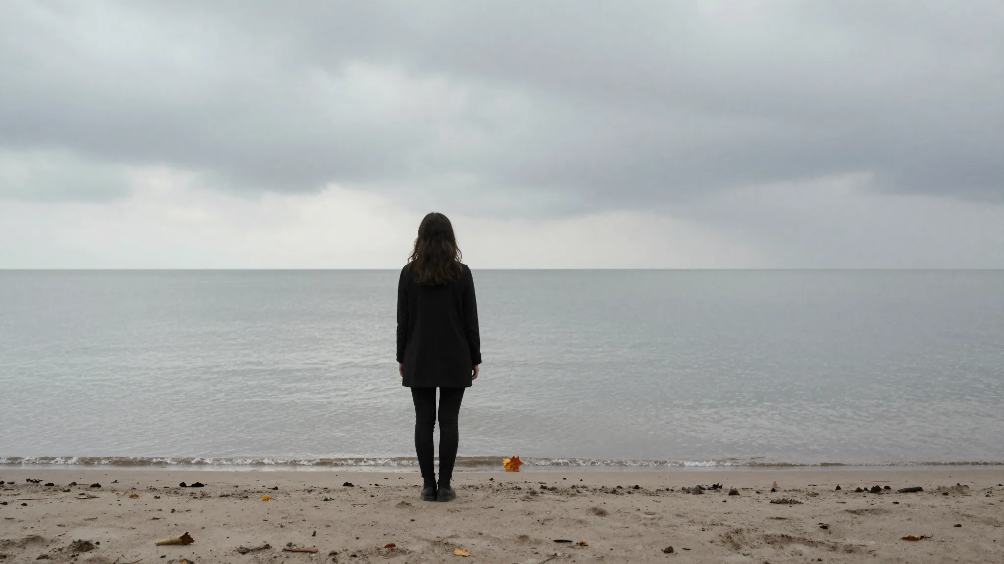 Watercolor style. A silhouette of a woman stands alone on a ...