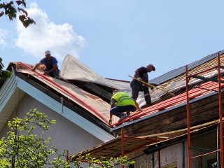 Крыши 35 домов отремонтировали в Подольске с начала года